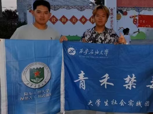 1786086656399559.jpg 图1 陆军工程大学实践人员与青禾禁毒实践团成员合影.jpg